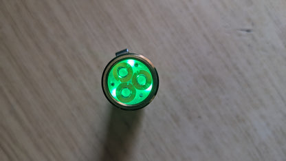 Custom hammered /aged Wurkkos TS10 brass 4000k green aux battery, clip and glow in the dark diffuser included